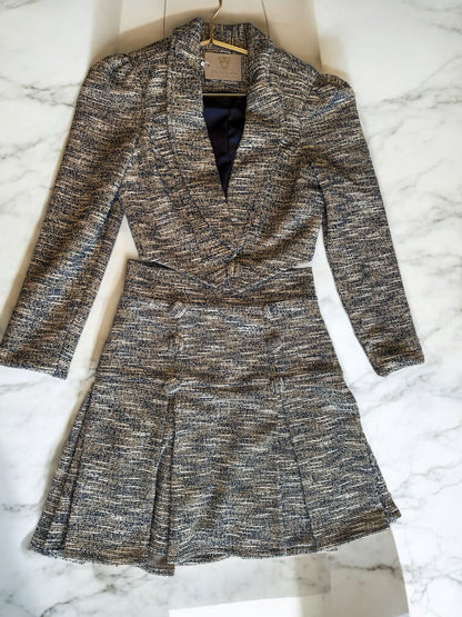 Set de jacket y falda corta con botones en Tweed