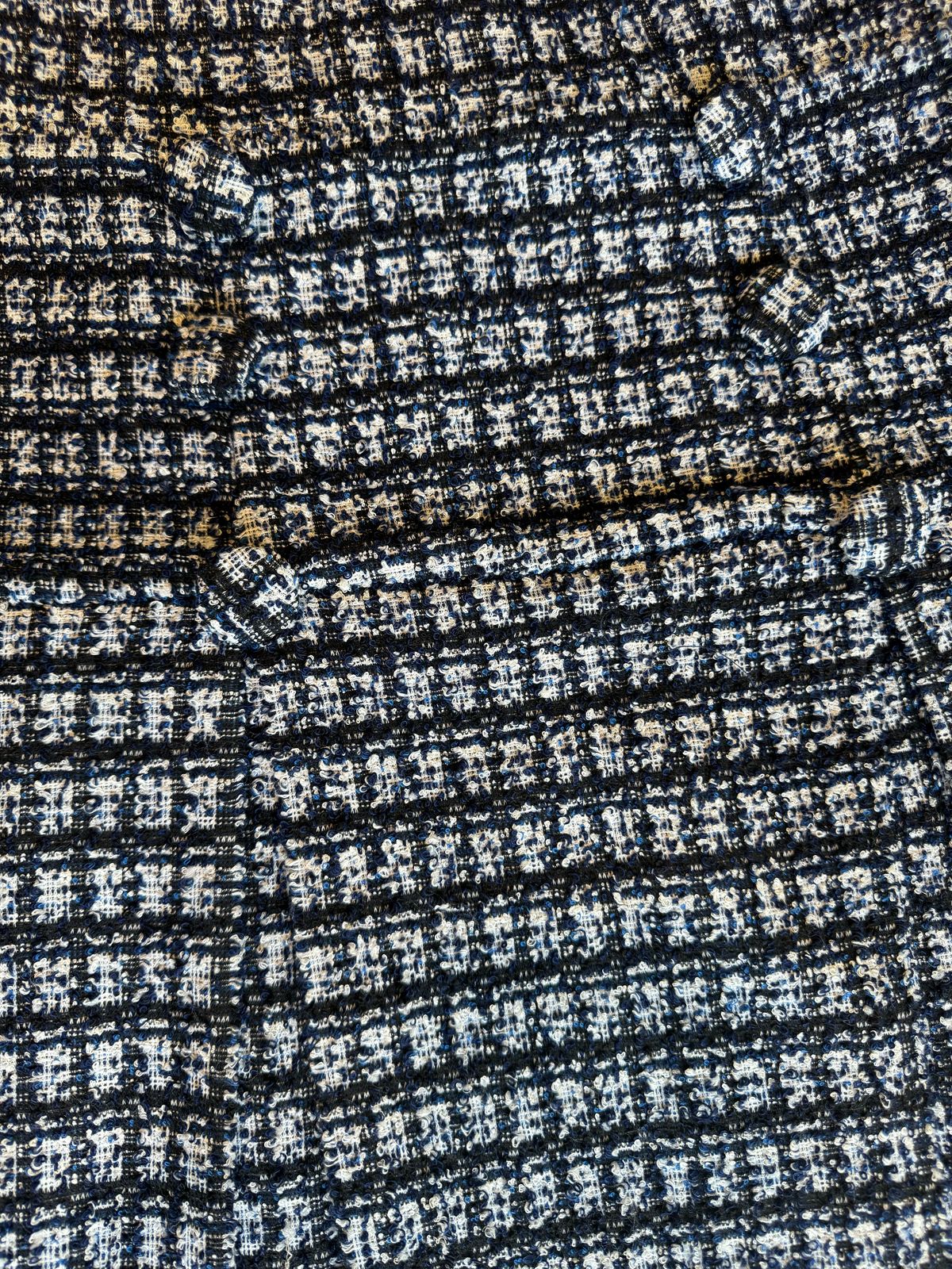 Set de jacket y falda corta con botones en Tweed