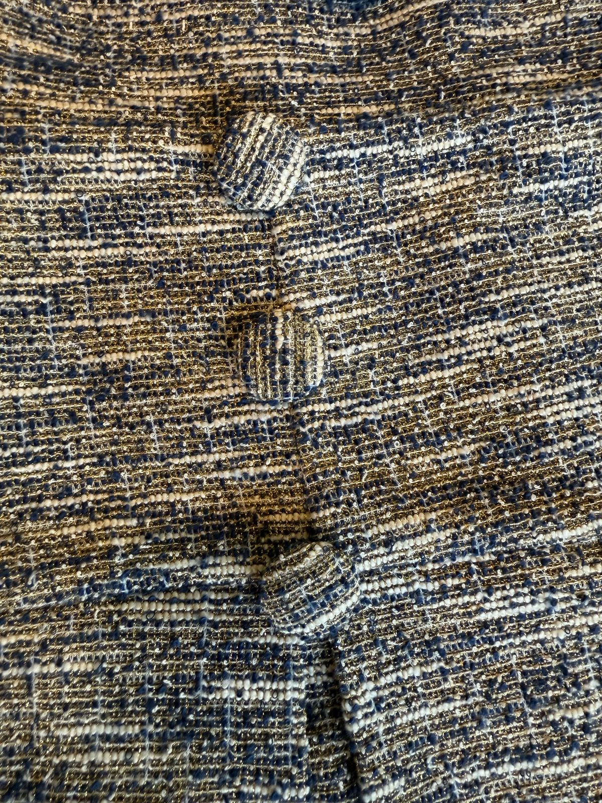 Set de jacket y falda corta con botones en Tweed