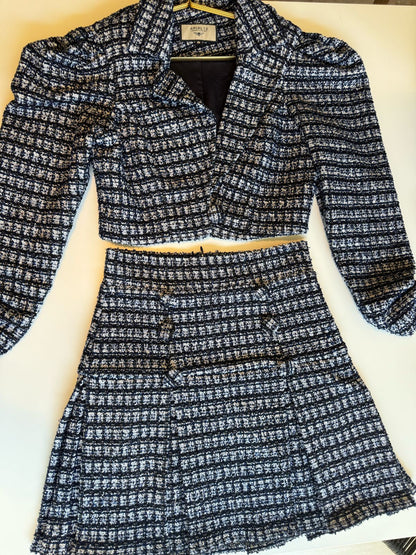 Set de jacket y falda corta con botones en Tweed